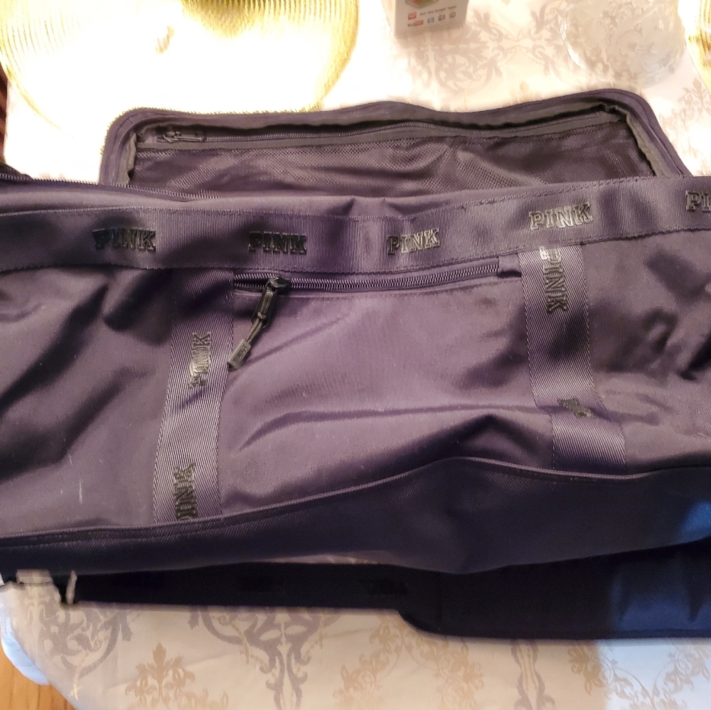 PINK- nice black duffle bag